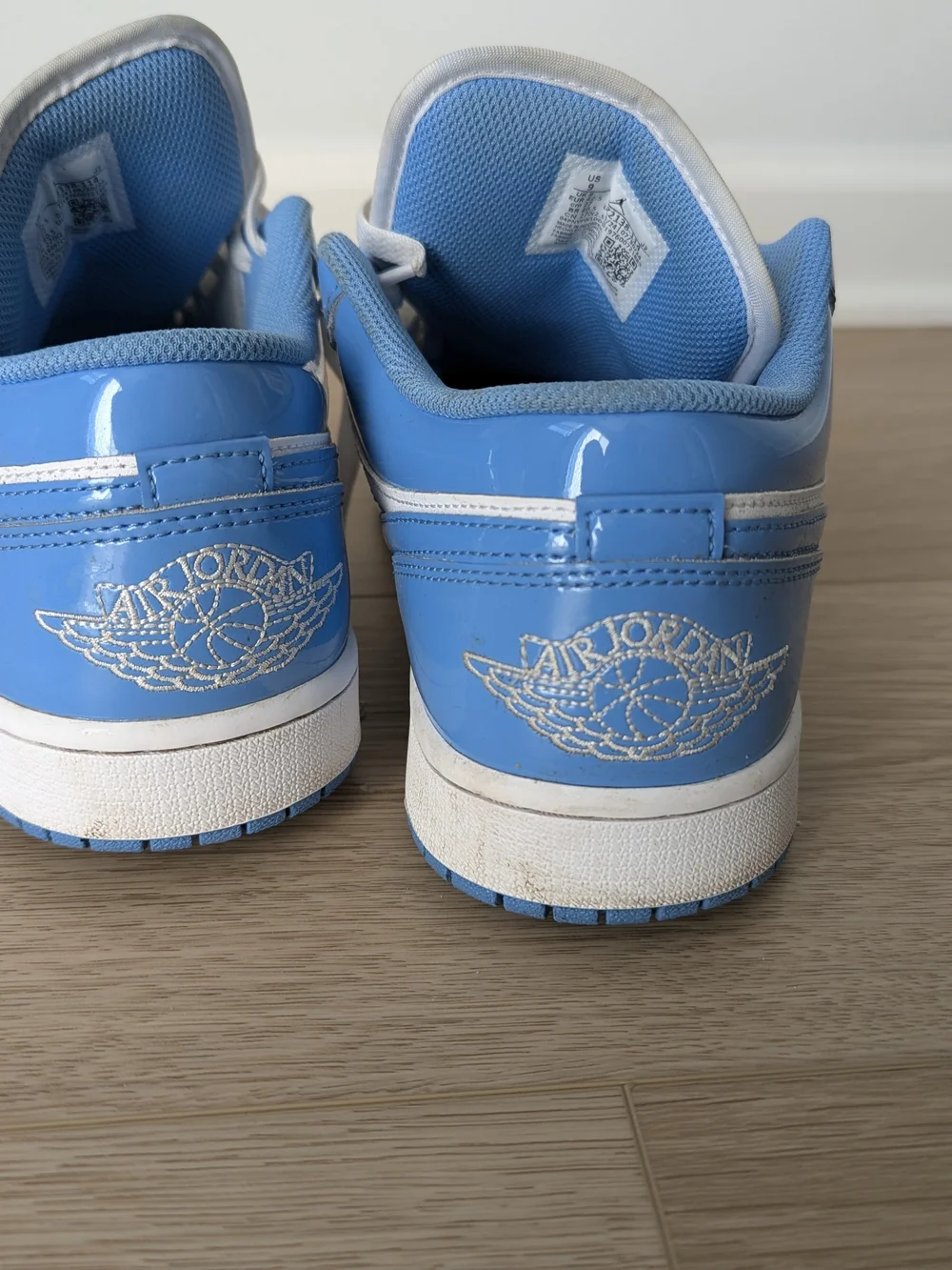 Jordan Men’s Low Top Sneakers in White & University Blue